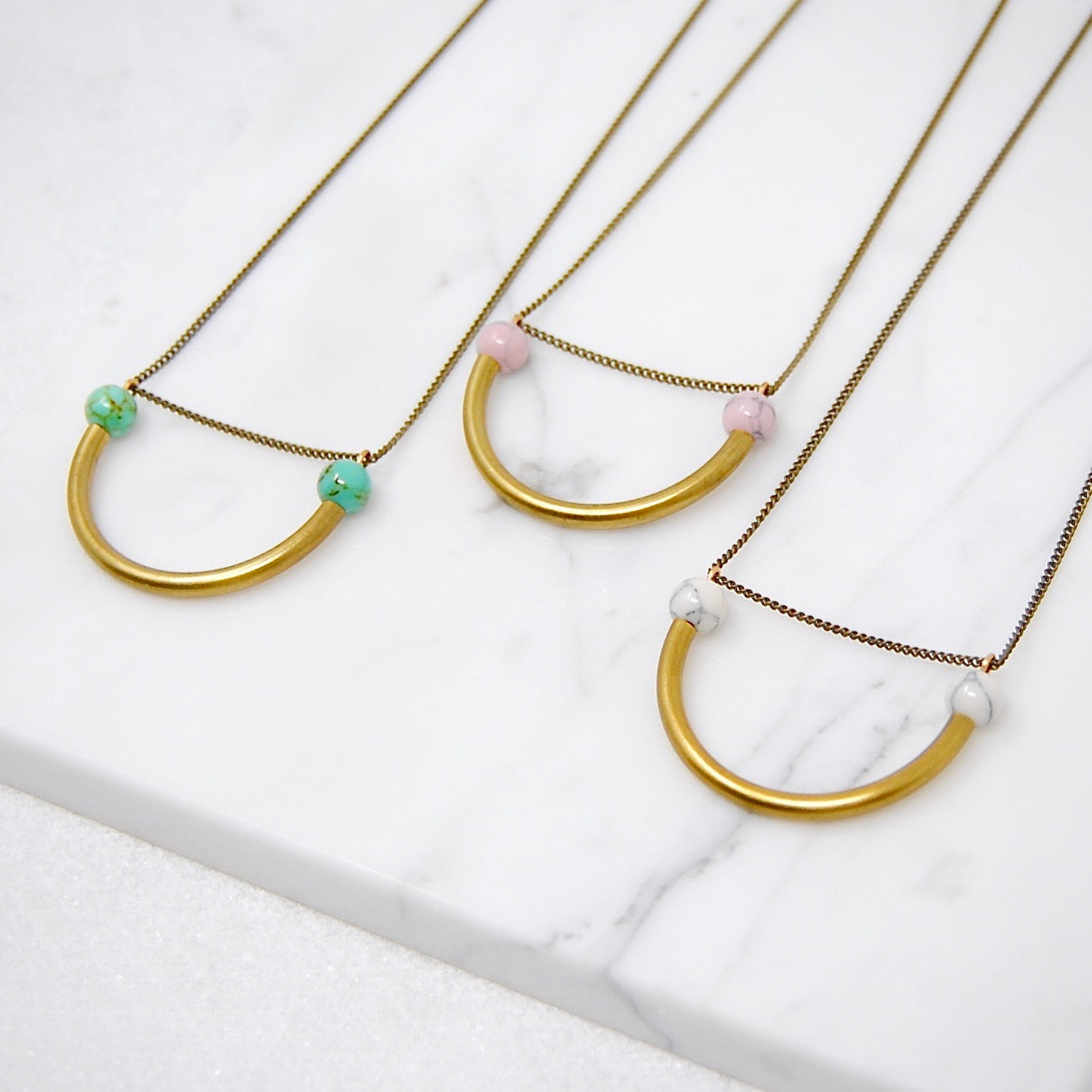 BEADED SEMICIRCLE NECKLACE